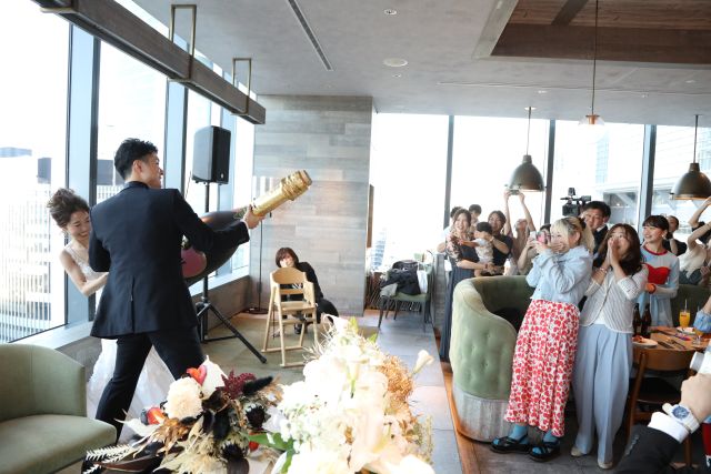 groom_firing_big_bottle_cracke 